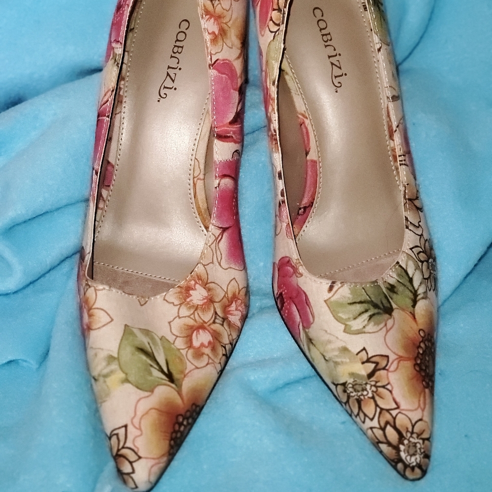Beautiful floral print heels with beige background